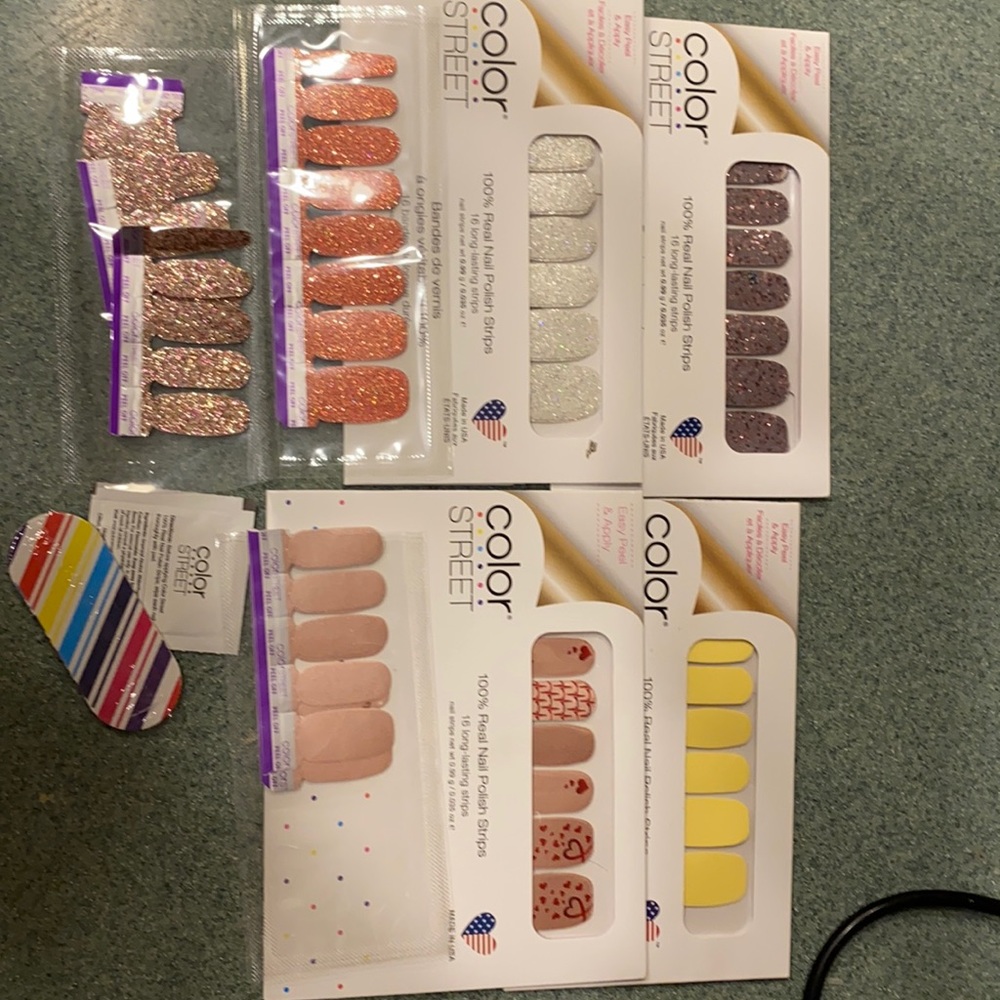 Four unopened sets and 3 partial sets of color street nail strips